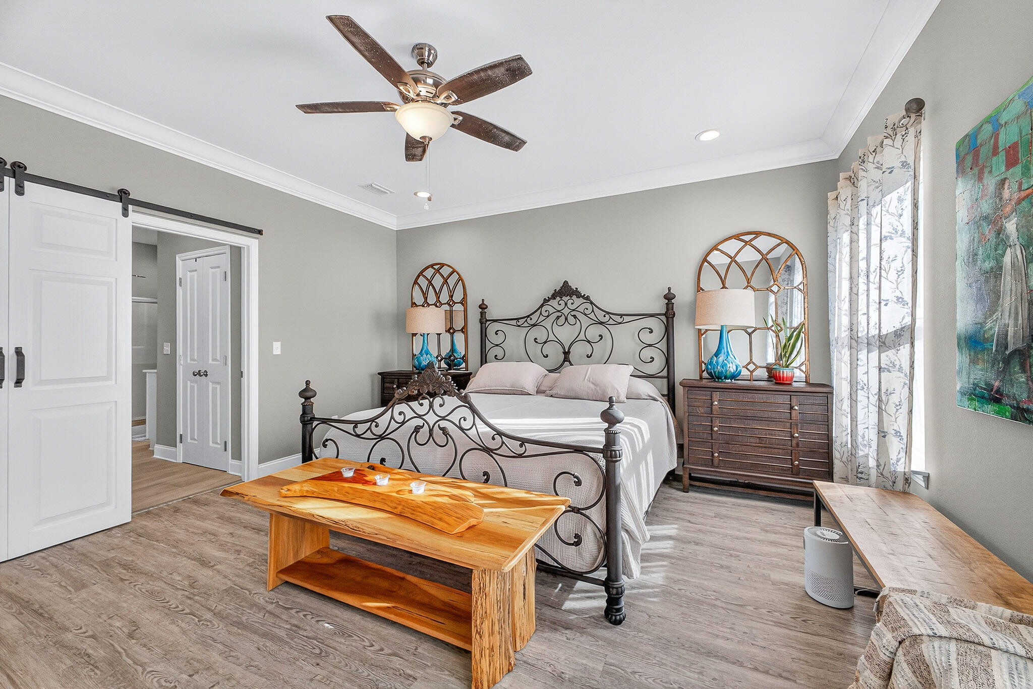 61 B 6th Street Shalimar, FL 32579 - Photo 49 of 59 a bedroom with a bed mirror and a window