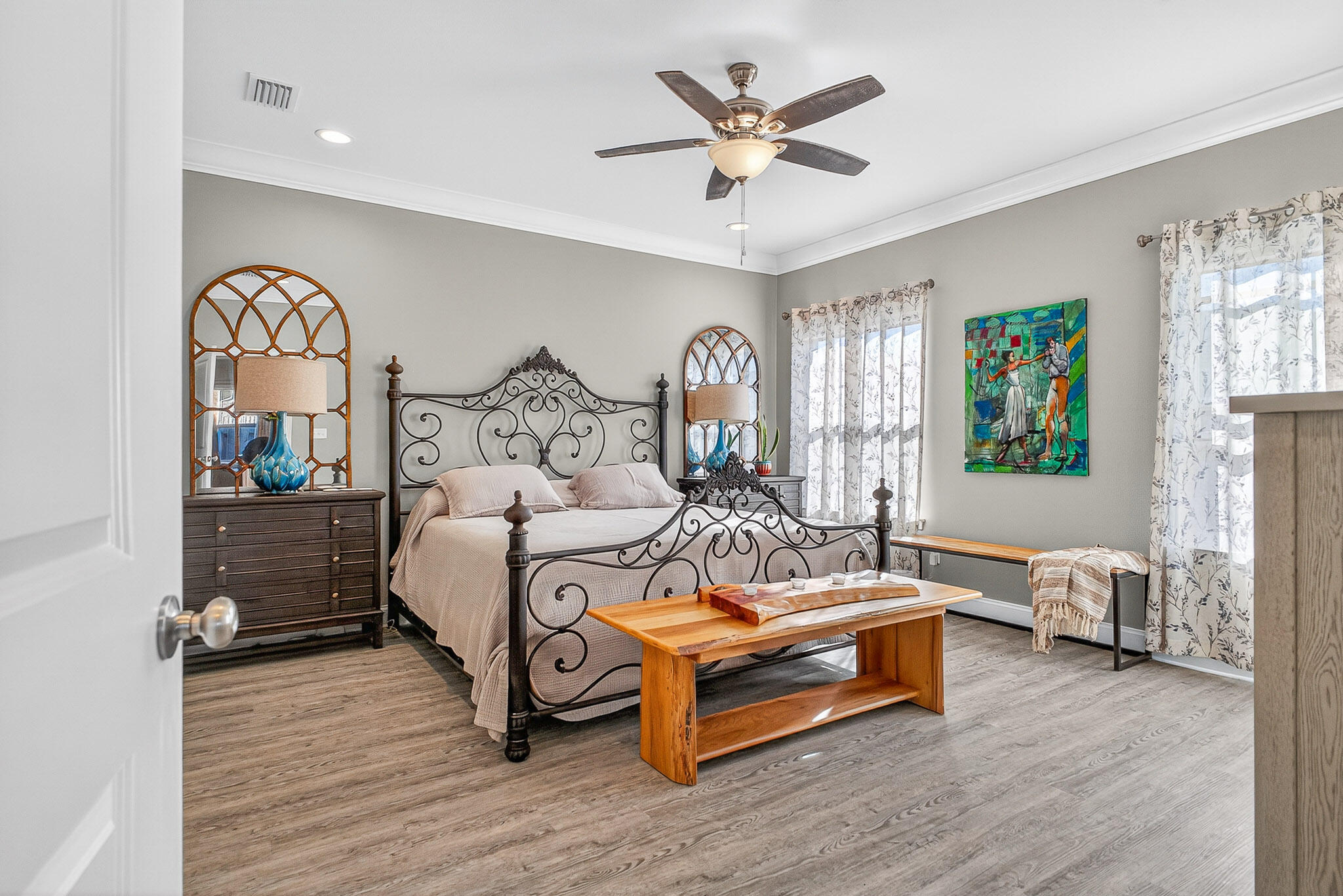 61 B 6th Street Shalimar, FL 32579 - Photo 53 of 59 a bedroom with furniture and wooden floor