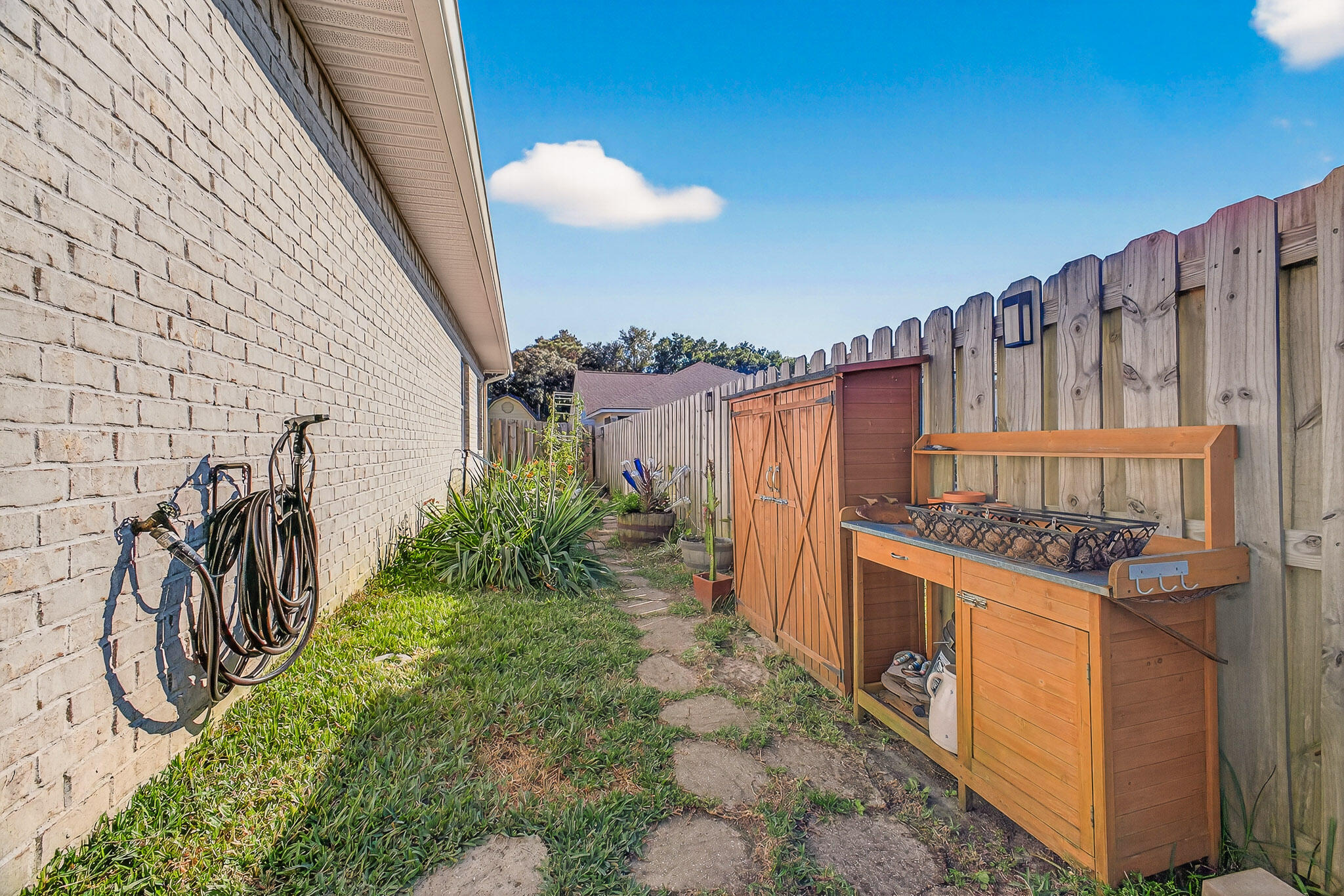 61 B 6th Street Shalimar, FL 32579 - Photo 59 of 59 a view of a backyard with pathway