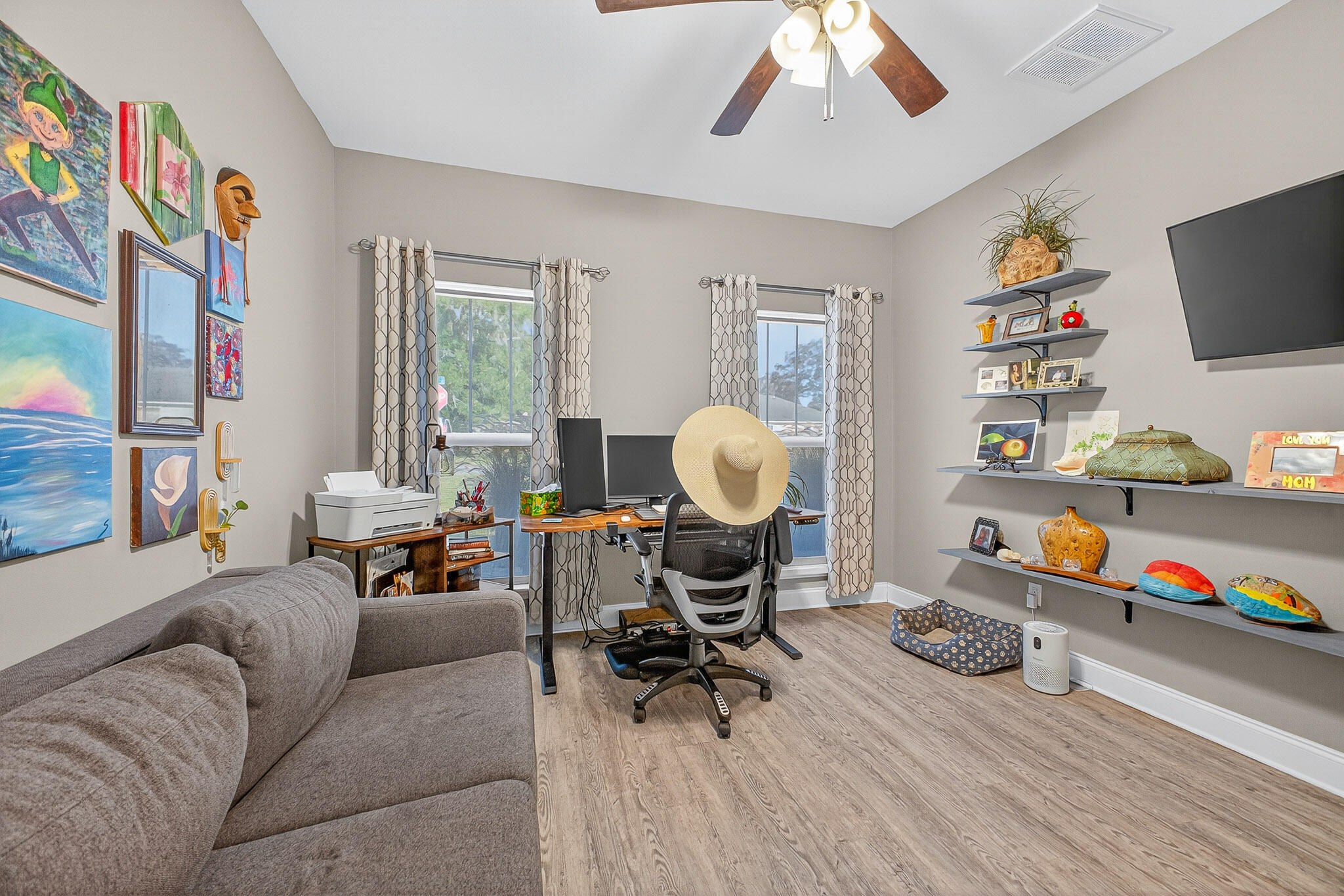 61 B 6th Street Shalimar, FL 32579 - Photo 6 of 59 a living room with furniture and a flat screen tv
