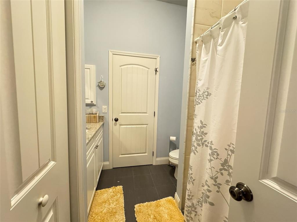 3108 North Wheaton Point Hernando, FL 34442 - Photo 14 of 35 a bathroom with a toilet and a shower