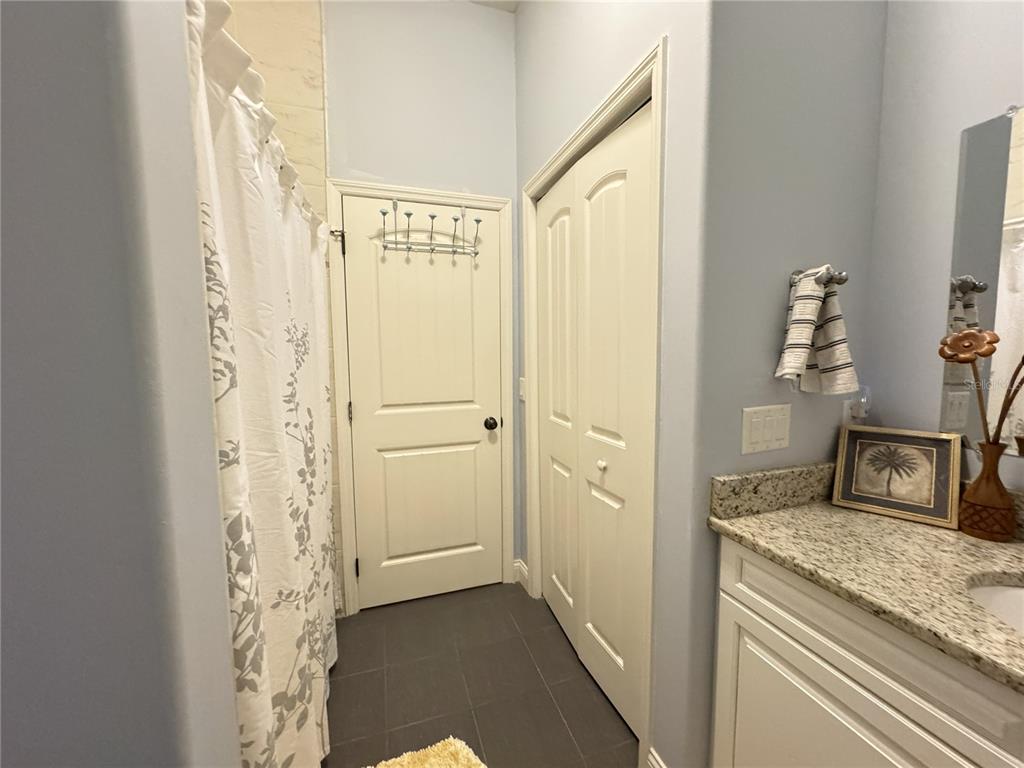 3108 North Wheaton Point Hernando, FL 34442 - Photo 15 of 35 a bathroom with a granite countertop sink and a mirror