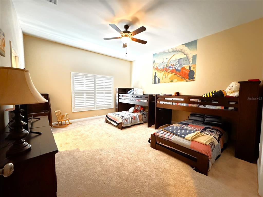 3108 North Wheaton Point Hernando, FL 34442 - Photo 17 of 35 a living room with furniture and a flat screen tv
