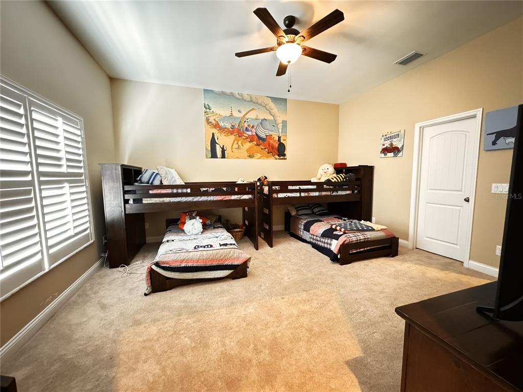 3108 North Wheaton Point Hernando, FL 34442 - Photo 18 of 35 a living room with furniture and a flat screen tv