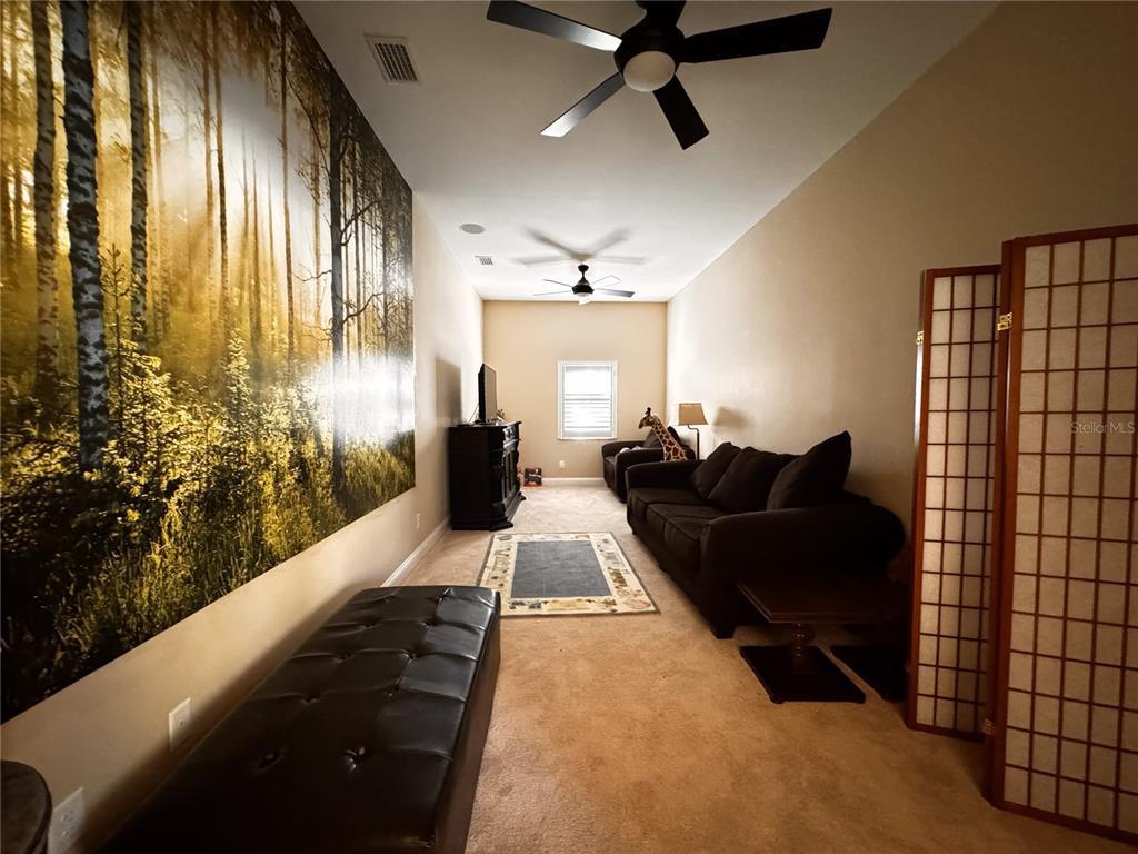 3108 North Wheaton Point Hernando, FL 34442 - Photo 20 of 35 a living room with furniture