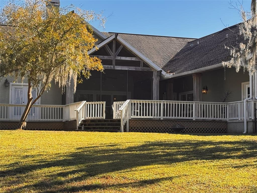 3108 North Wheaton Point Hernando, FL 34442 - Photo 26 of 35 a view of a balcony with a yard
