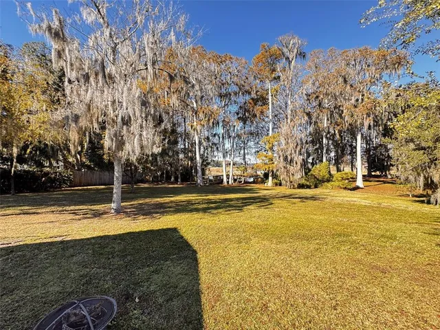 a view of a swimming pool with an outdoor space