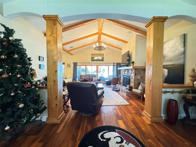 a view of a living room and a balcony