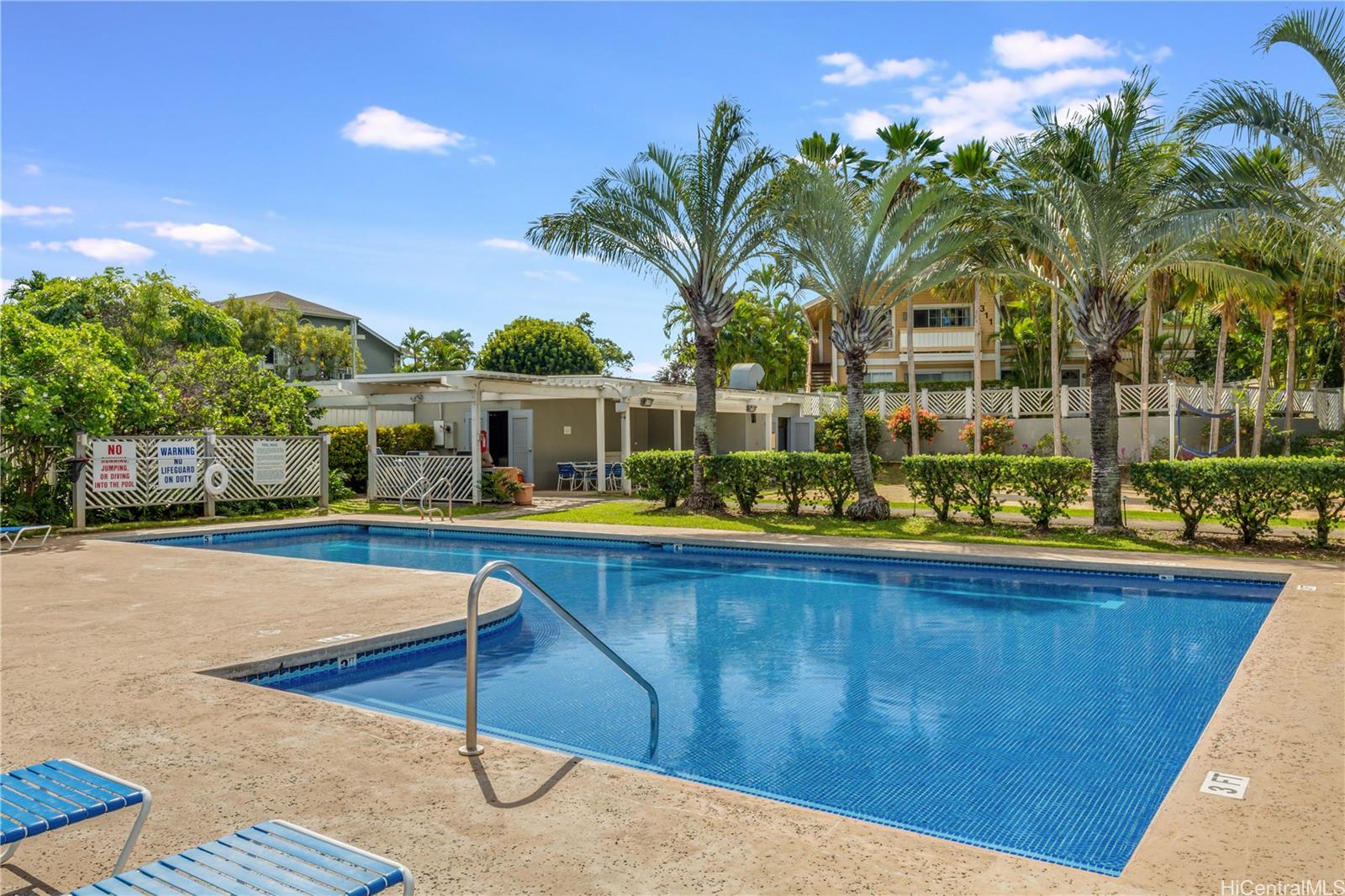 432 Mananai Place, Unit 18C Honolulu, HI 96818 - Photo 11 of 17 a view of a house with swimming pool