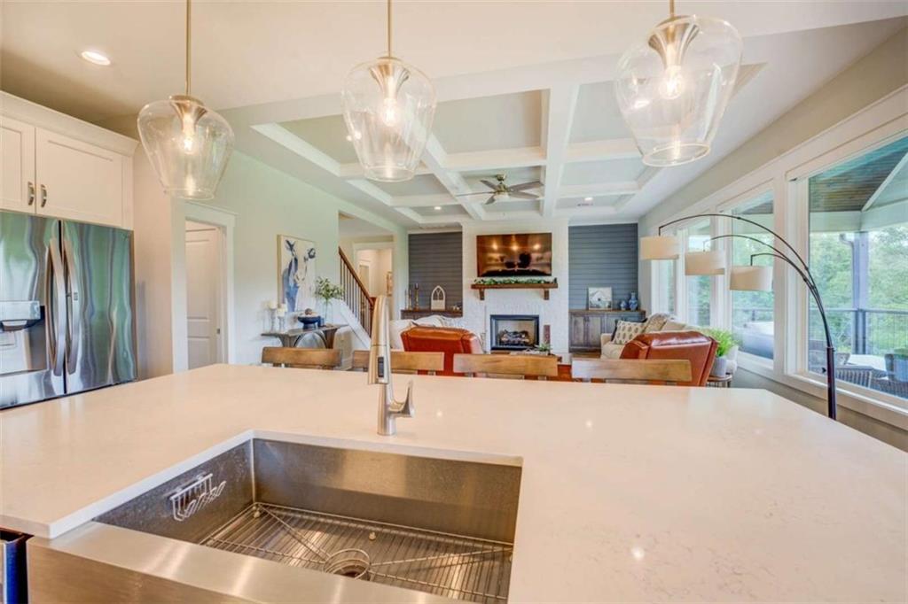 3076 East Lake Road McDonough, GA 30252 - Photo 14 of 49 a view of a living room and kitchen