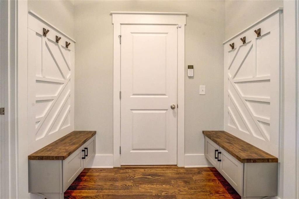 3076 East Lake Road McDonough, GA 30252 - Photo 19 of 49 a kitchen with white cabinets and a sink
