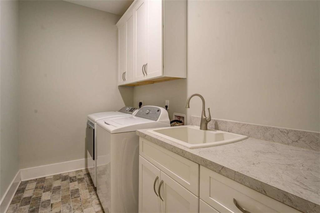 3076 East Lake Road McDonough, GA 30252 - Photo 21 of 49 a close view of sink and tap