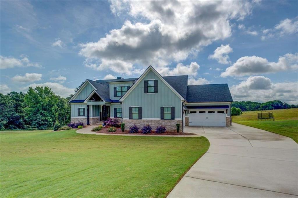 3076 East Lake Road McDonough, GA 30252 - Photo 47 of 49 a front view of house with yard and green space