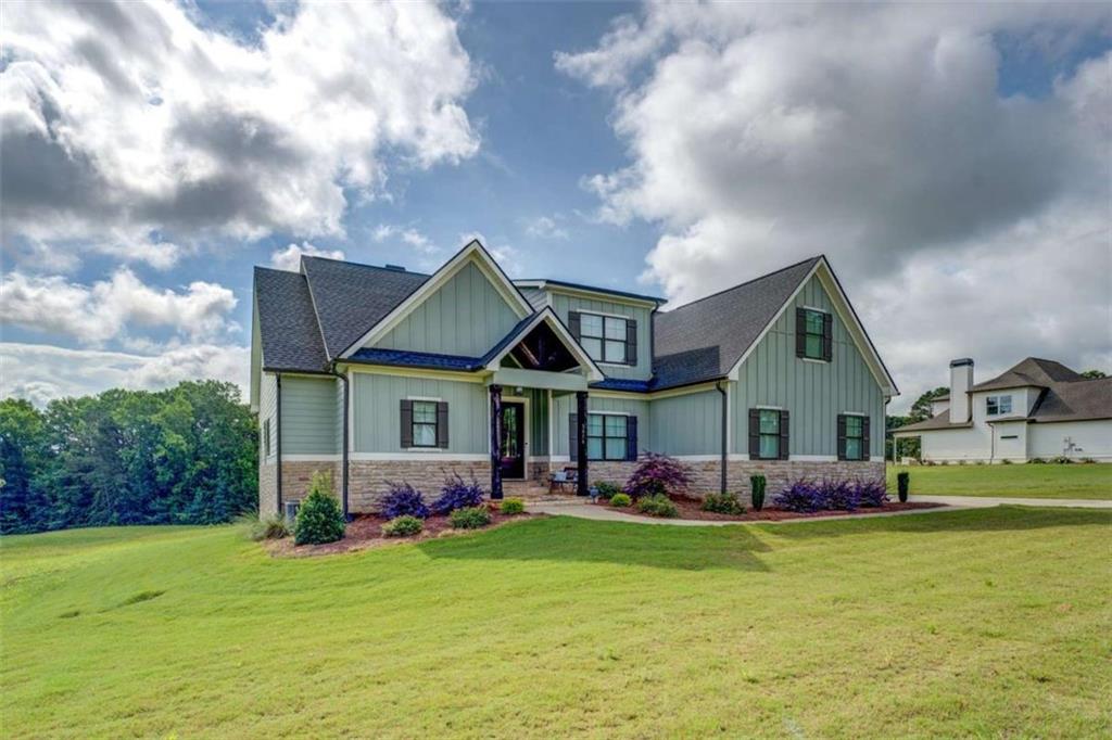 3076 East Lake Road McDonough, GA 30252 - Photo 49 of 49 a front view of house with yard and green space