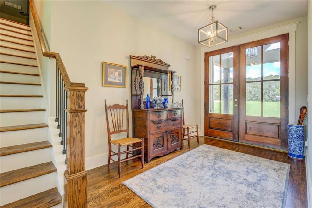 3076 East Lake Road McDonough, GA 30252 - Photo 6 of 49 a room with furniture and a window