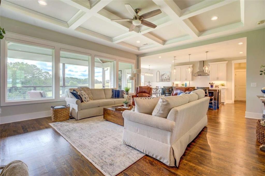 3076 East Lake Road McDonough, GA 30252 - Photo 10 of 49 a living room with furniture and a large window