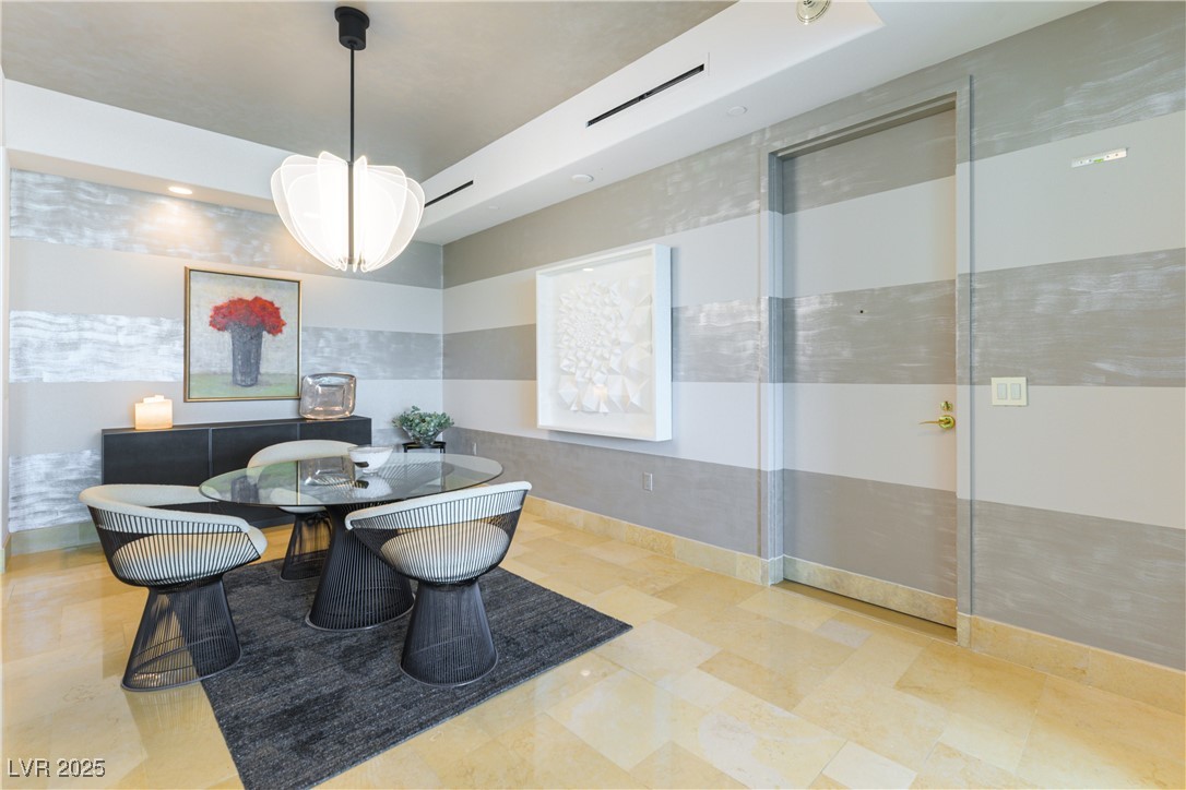 9101 Alta Drive, Unit 505 Las Vegas, NV 89145 - Photo 3 of 64 Dining room featuring tile walls