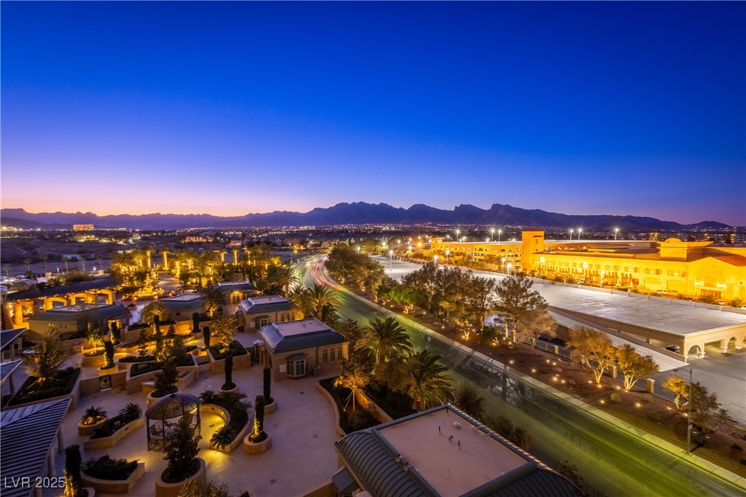 9101 Alta Drive, Unit 505 Las Vegas, NV 89145 - Photo 35 of 64 Drone / aerial view of a mountainous background