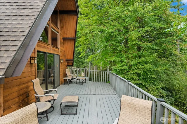 a view of a balcony with a tree