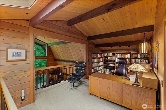 a en suite bathroom with a granite countertop sink