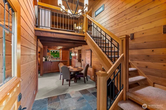a view of a patio with table and chairs