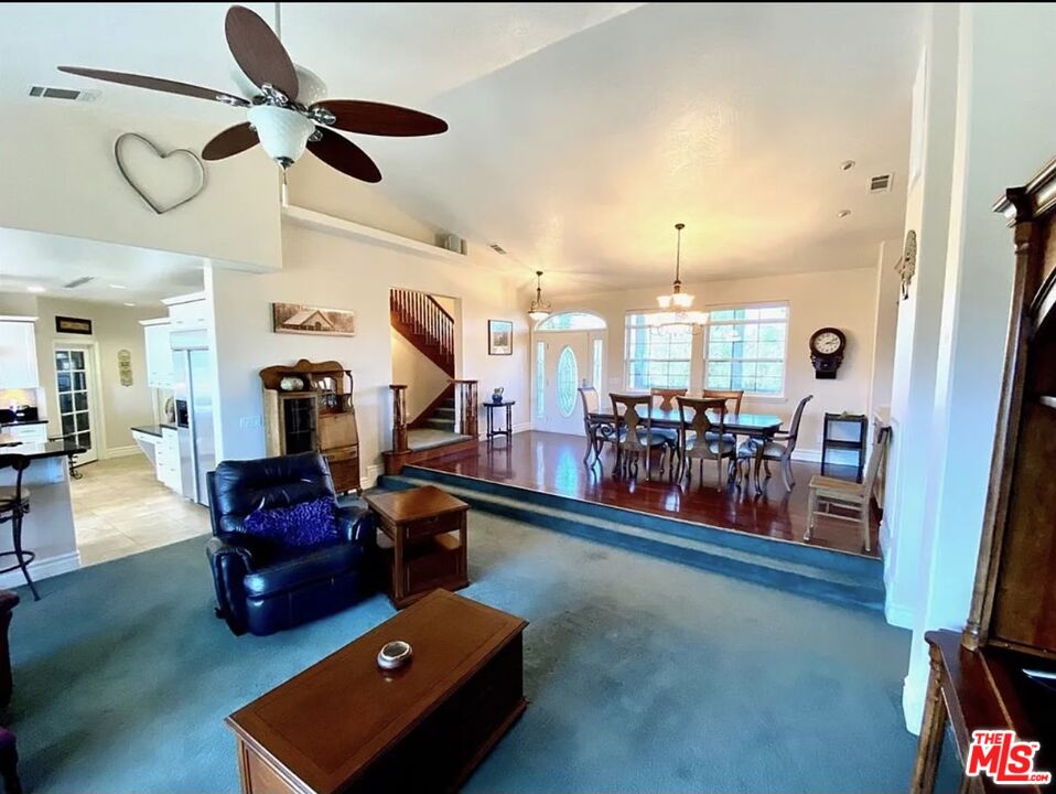 7173 Barker Road Oak Hills, CA 92344 - Photo 15 of 26 a living room with furniture