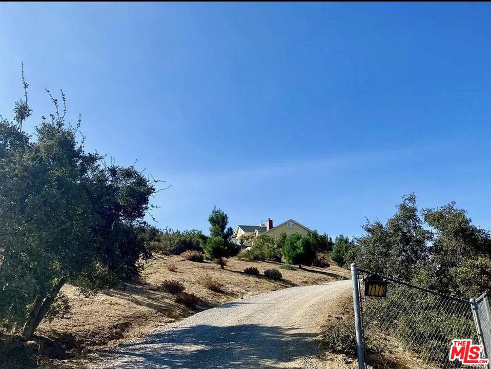 7173 Barker Road Oak Hills, CA 92344 - Photo 26 of 26 a view of a backyard