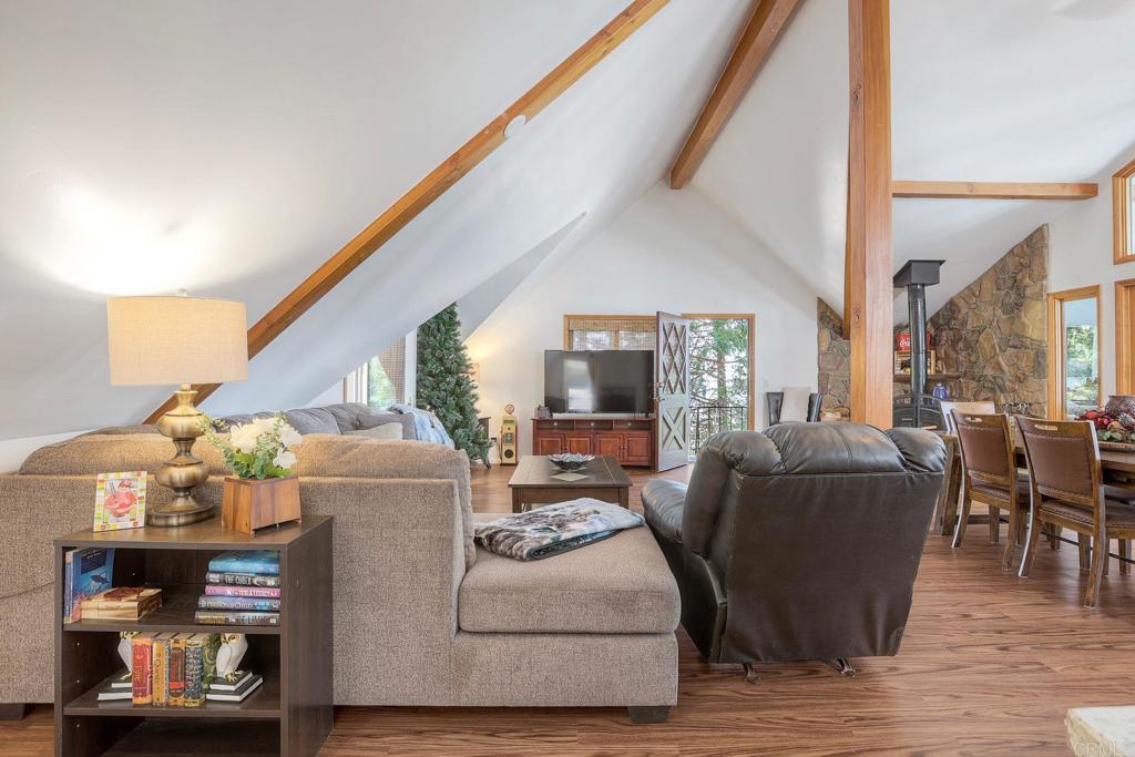 22223 Crestline Road Palomar Mountain, CA 92060 - Photo 55 of 90 a living room with furniture and wooden floor