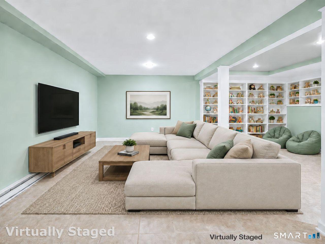 21 Overlook Place Trumbull, CT 06611 - Photo 25 of 37 Fully finished heated lower level with walk-out, offers loads of possibilities...this versatile area would be a great space for a library, home office, gym or flexible multi-purpose living area.
