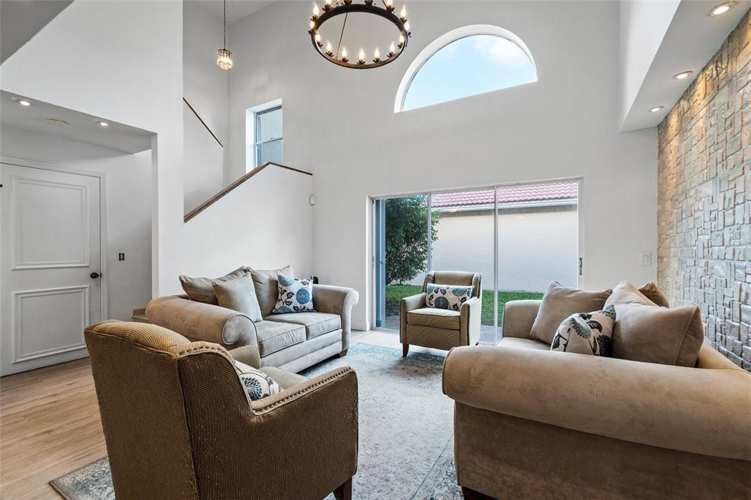 22360 Overture Circle Boca Raton, FL 33428 - Photo 5 of 32 Living room w/ volume ceiling