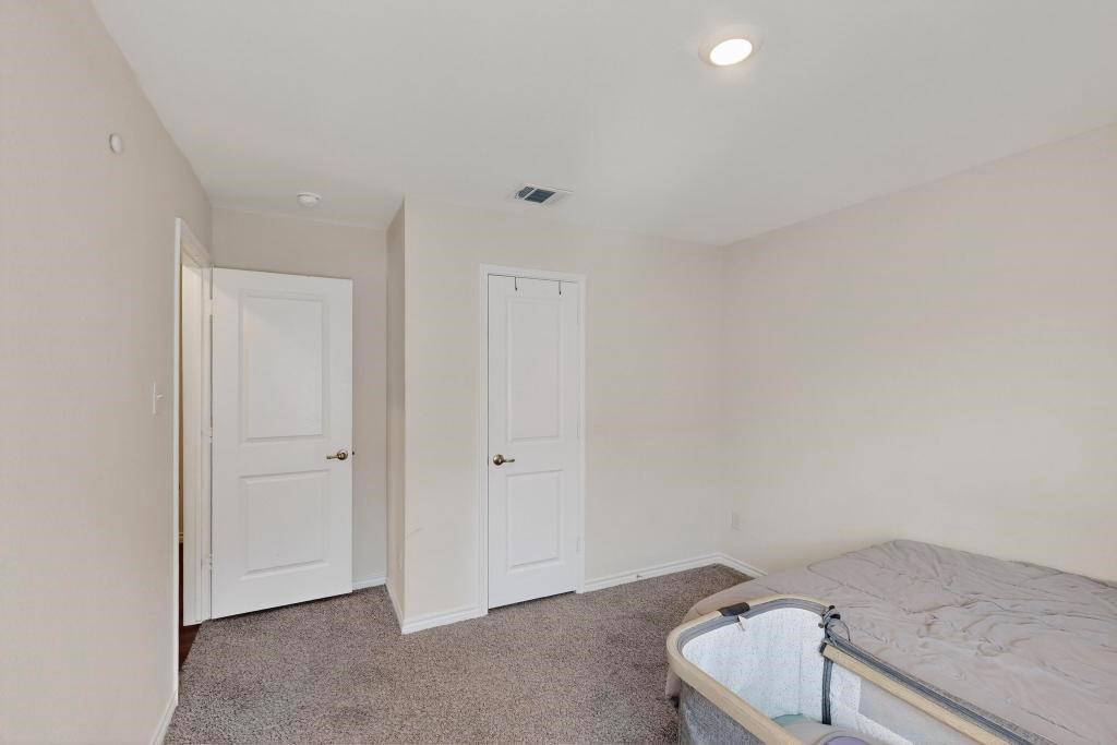 504 Willow View Way Princeton, TX 75407 - Photo 12 of 21 a living room with a couch and a ceiling fan
