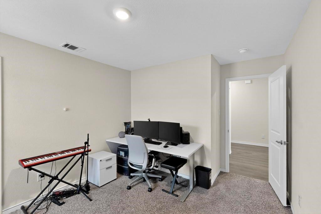 504 Willow View Way Princeton, TX 75407 - Photo 13 of 21 a view of a workspace with furniture