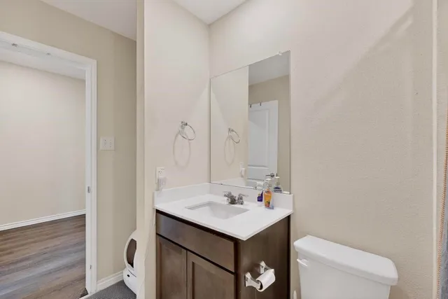 a bathroom with a sink and a toilet
