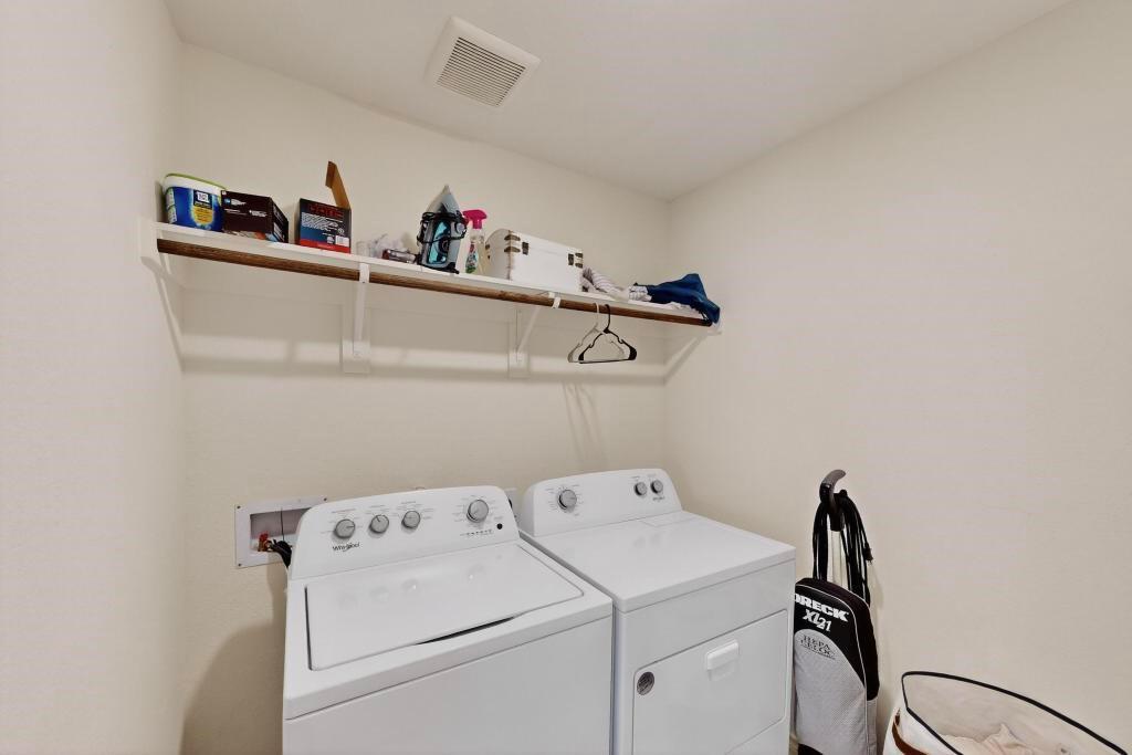 504 Willow View Way Princeton, TX 75407 - Photo 18 of 21 a utility room with dryer and washer