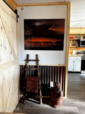 a view of entryway with wooden floor