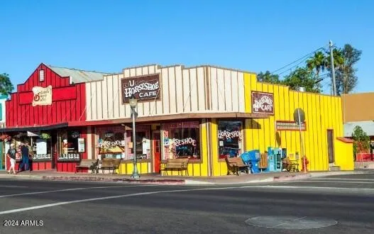 a view of street with shops