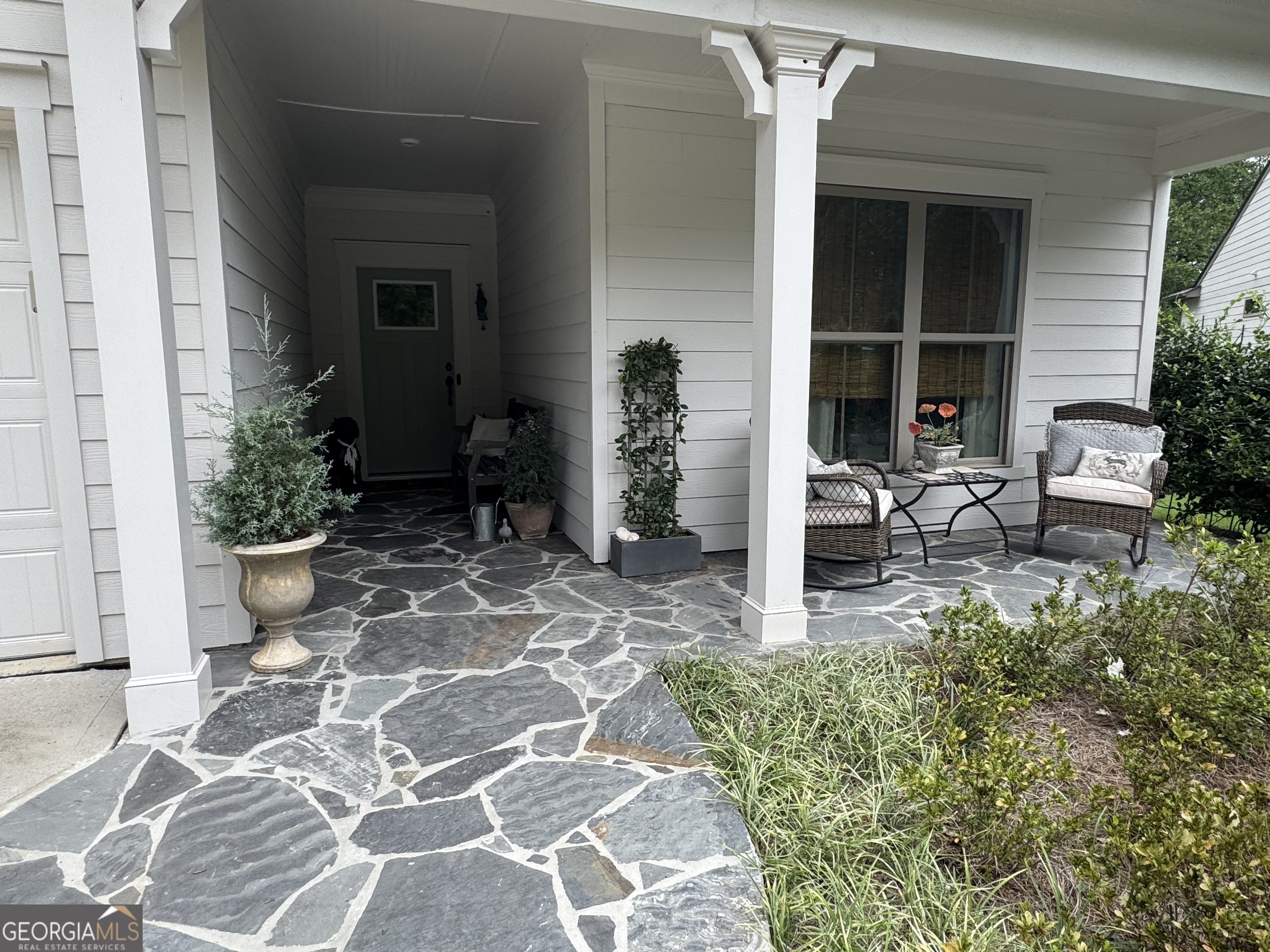 5947 Maple Bluff Way Hoschton, GA 30548 - Photo 2 of 32 a view of a entryway front of house