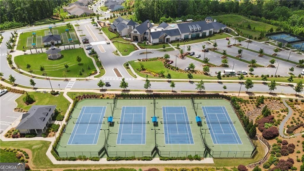 5947 Maple Bluff Way Hoschton, GA 30548 - Photo 22 of 32 an aerial view of a swimming pool