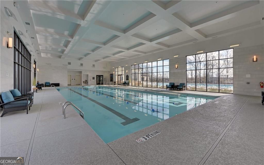 5947 Maple Bluff Way Hoschton, GA 30548 - Photo 25 of 32 a view of a living room and bathroom