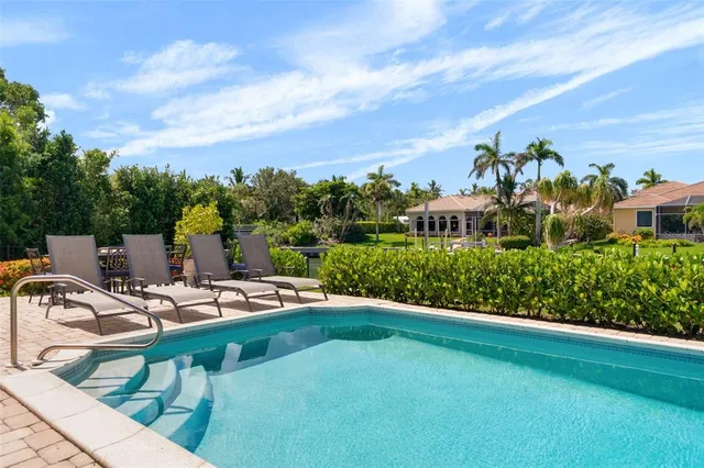a view of a house with a swimming pool