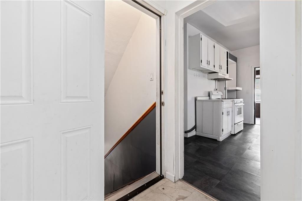 2123 Lautner Street Pittsburgh, PA 15212 - Photo 18 of 32 a view of an empty room with wooden floor and a window