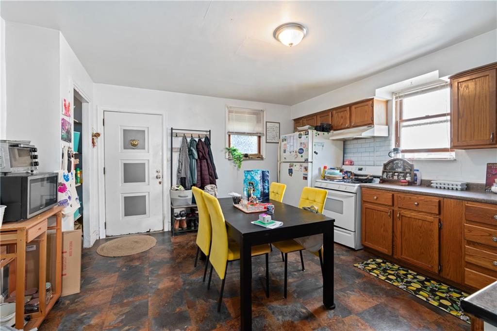 2123 Lautner Street Pittsburgh, PA 15212 - Photo 20 of 32 a view of a dining room with furniture window and wooden floor
