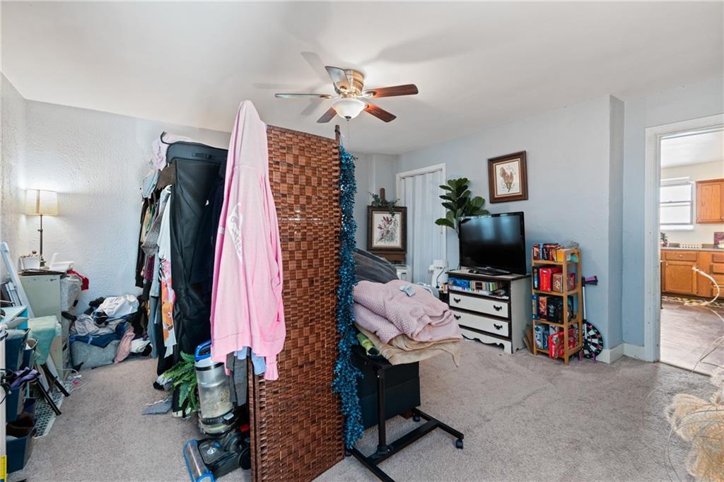 2123 Lautner Street Pittsburgh, PA 15212 - Photo 25 of 32 a view of a livingroom with furniture and a flat screen tv