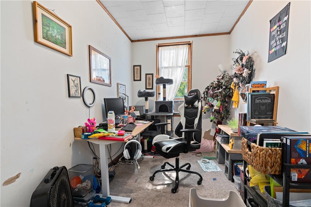 2123 Lautner Street Pittsburgh, PA 15212 - Photo 26 of 32 a view of a workspace with furniture and a window