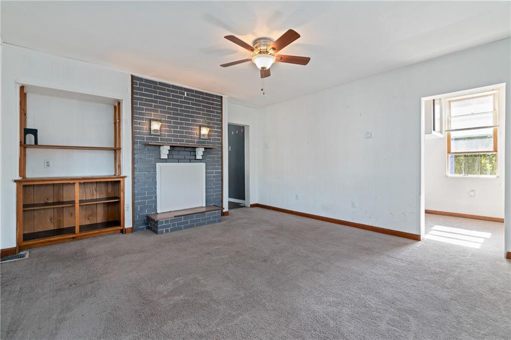 2123 Lautner Street Pittsburgh, PA 15212 - Photo 8 of 32 a view of an empty room with a ceiling fan