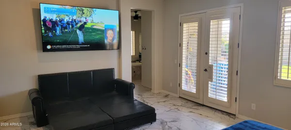 a living room with furniture and a window