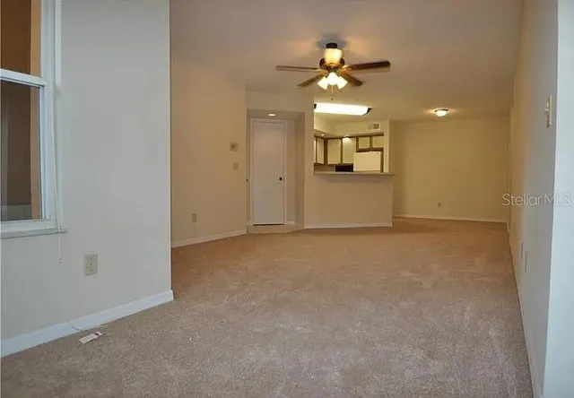 an empty room with a bathroom