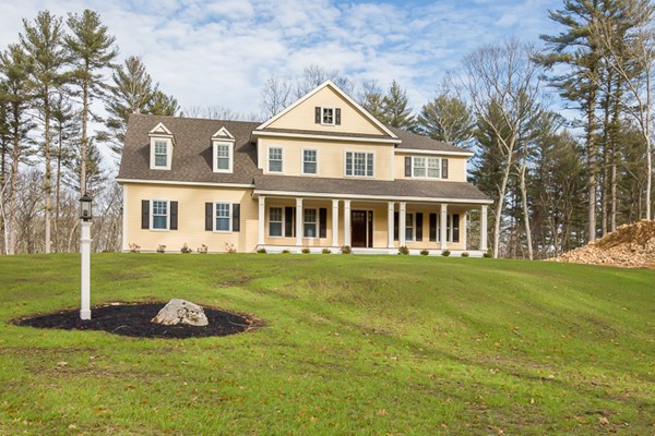 230 B Middleton Road Boxford, MA 01921 - Photo 1 of 5 a front view of a house with a garden