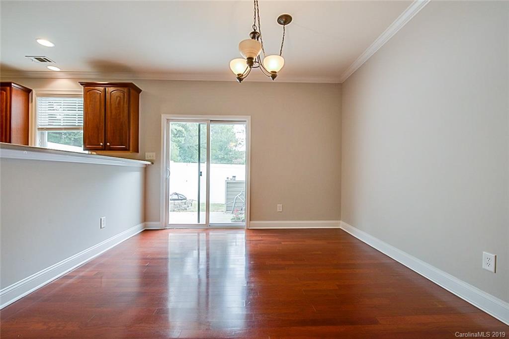 234 River Clay Road Fort Mill, SC 29708 - Photo 6 of 15 a view of an empty room with wooden floor and a window