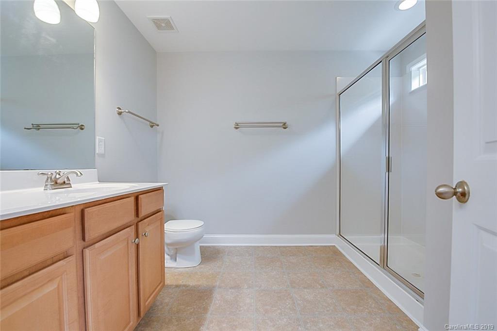 234 River Clay Road Fort Mill, SC 29708 - Photo 9 of 15 a bathroom with a sink a toilet and shower